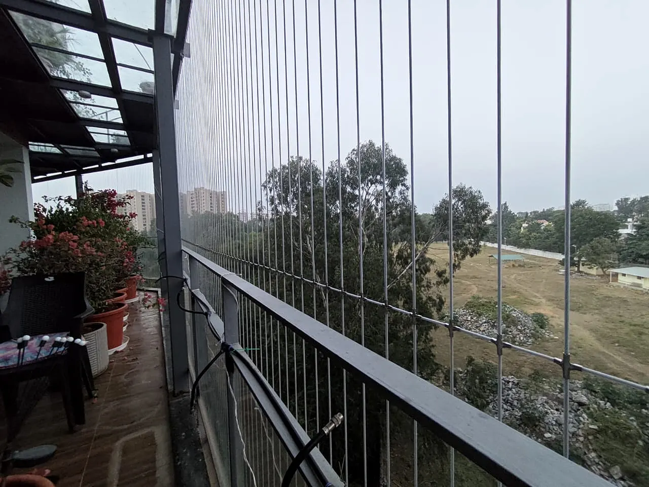 Invisible Balcony Grill Installation Professional Installation in Pullepady, Kerala by Deva Safety Nets